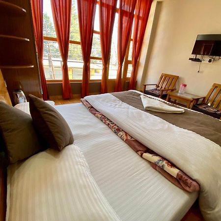 Hotel Mansarovar Inn Munsyari Kültér fotó