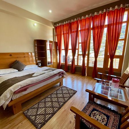 Hotel Mansarovar Inn Munsyari Kültér fotó