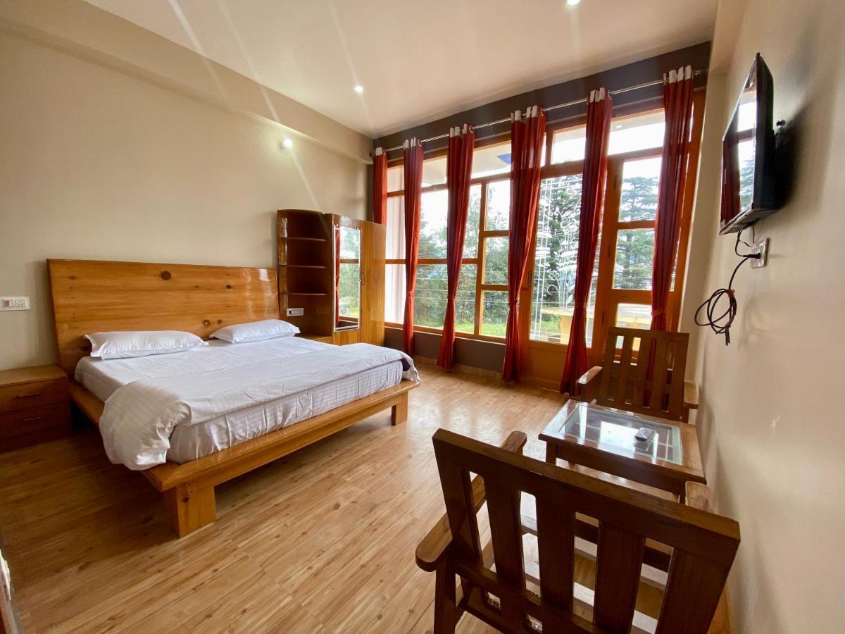 Hotel Mansarovar Inn Munsyari Kültér fotó
