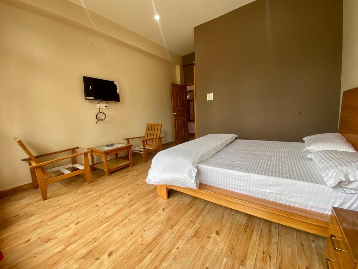 Hotel Mansarovar Inn Munsyari Kültér fotó