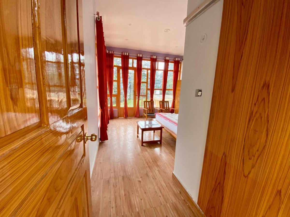 Hotel Mansarovar Inn Munsyari Kültér fotó