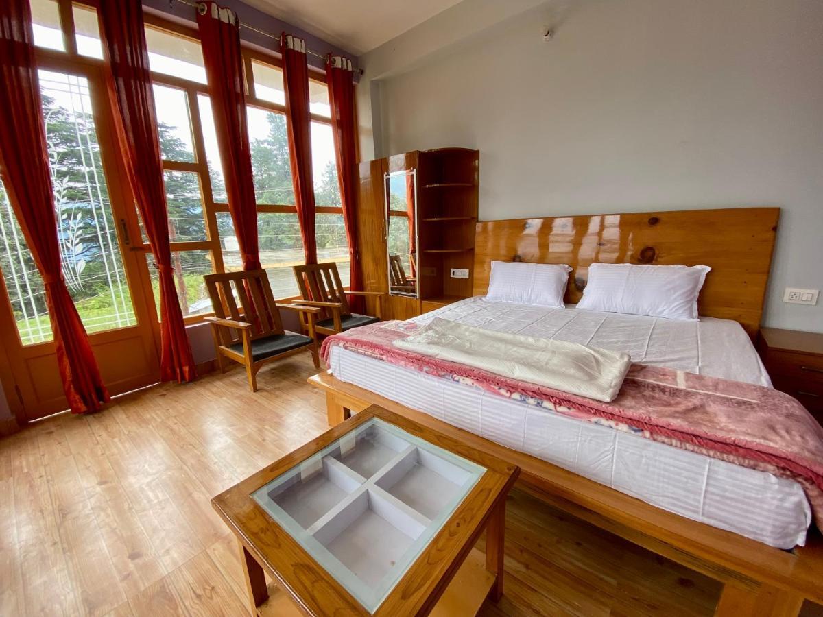 Hotel Mansarovar Inn Munsyari Kültér fotó