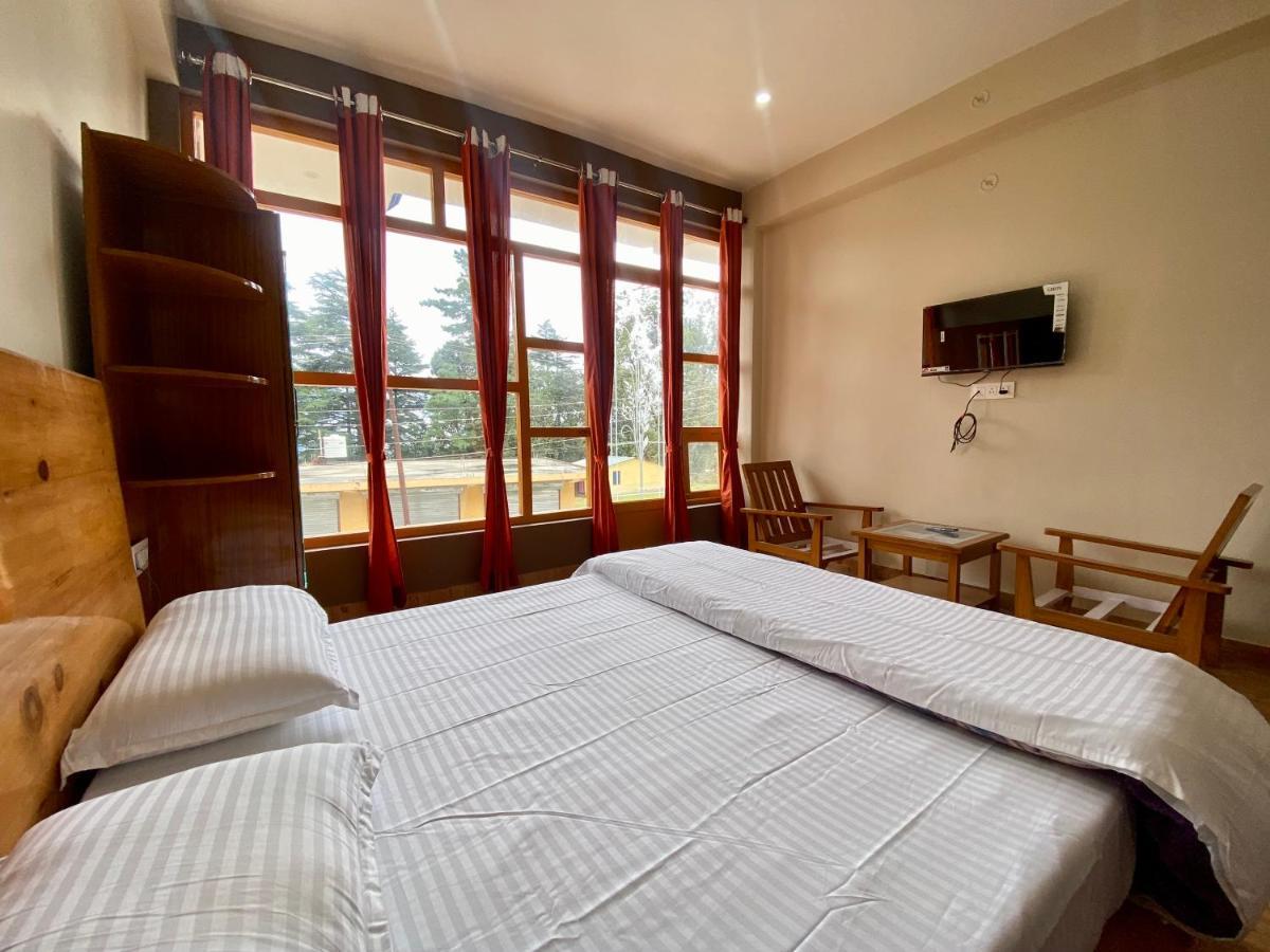 Hotel Mansarovar Inn Munsyari Kültér fotó