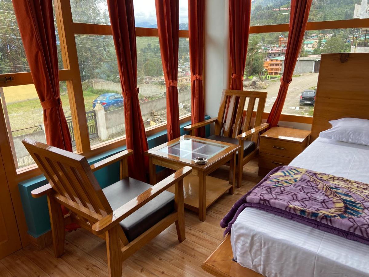Hotel Mansarovar Inn Munsyari Kültér fotó
