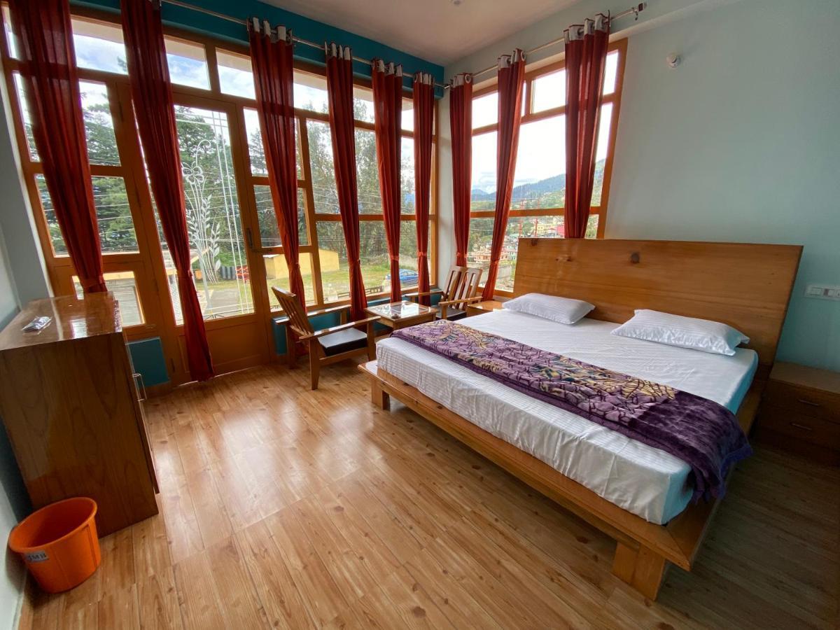 Hotel Mansarovar Inn Munsyari Kültér fotó