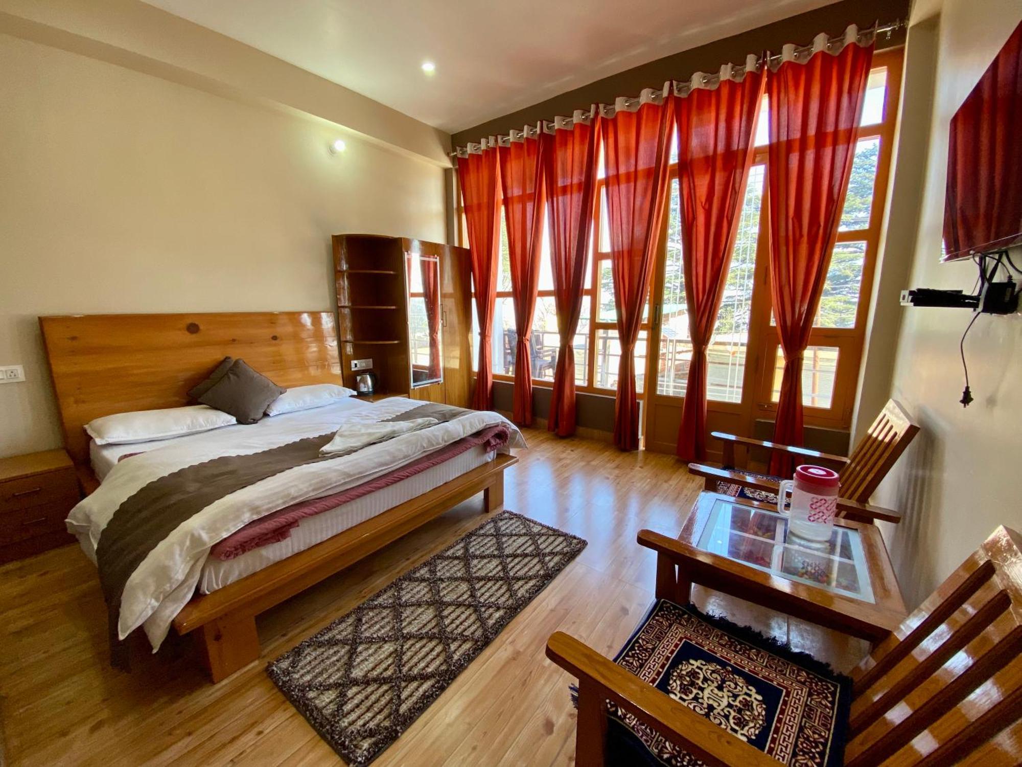 Hotel Mansarovar Inn Munsyari Kültér fotó
